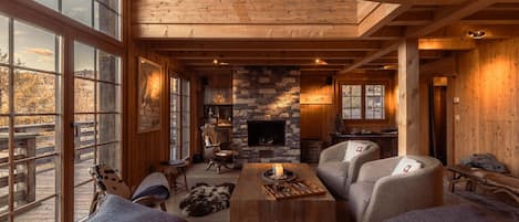 Chalet (5 Bedrooms) | Living room | 65-inch TV with cable channels, fireplace, heated floors