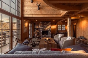 Chalet (5 Bedrooms) | Living room | 65-inch TV with cable channels, fireplace, heated floors - Chalet La Tsoum (Riddes)
