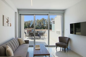 Deluxe Apartment | Living area | TV - Phaedrus Living: Seaside Deluxe Flat Harbour 112 (Paphos)