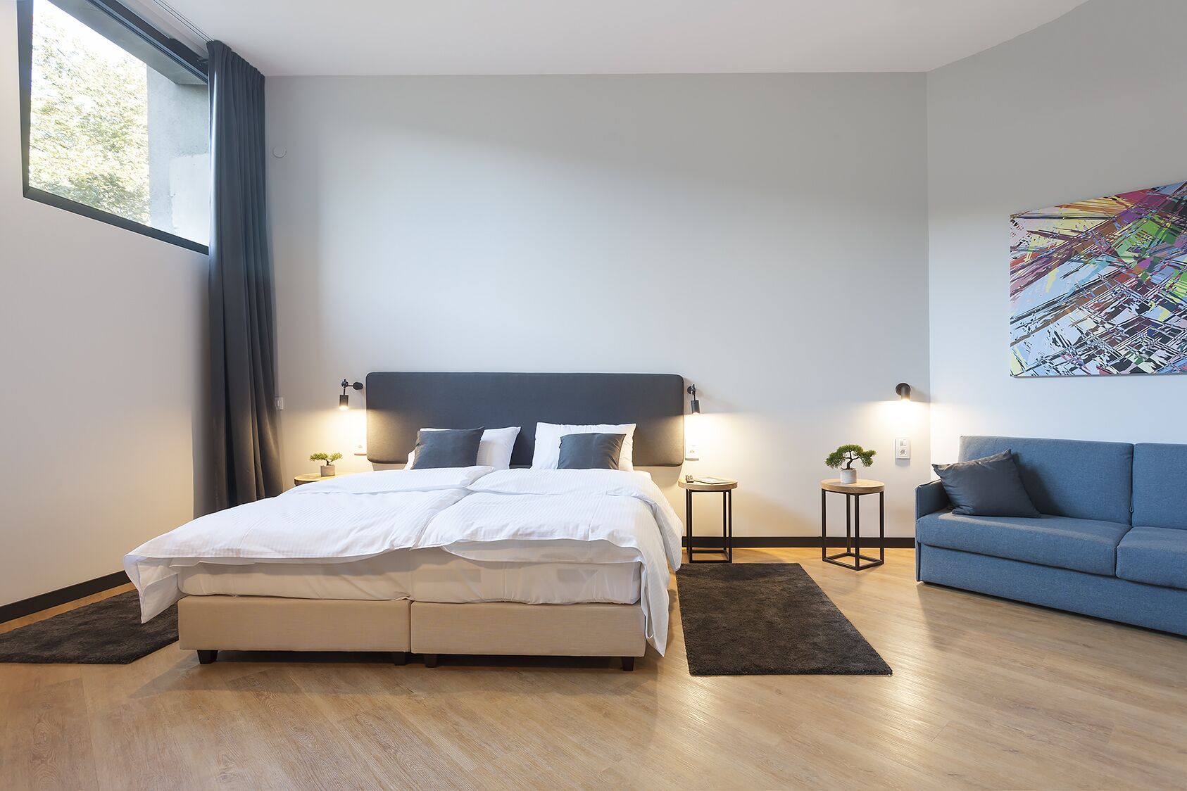 Habitación cuádruple superior | Minibar, escritorio, insonorización y wifi gratis 