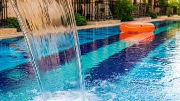 Seasonal outdoor pool, open 9:00 AM to 8:00 PM, pool loungers