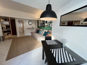 Apartment, 1 Bedroom, Sea View | Living area | 42-inch LCD TV with cable channels, TV