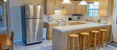Townhome, 2 Bedrooms | Private kitchen | Fridge, oven, stovetop, coffee/tea maker