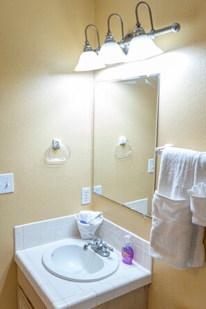 House, 2 Bedrooms | Bathroom | Free toiletries, towels, shampoo - Ground Floor Duplex 1/2 block to Beach BBQ ok 2 Bedroom Home by RedAwning (South Padre Island)