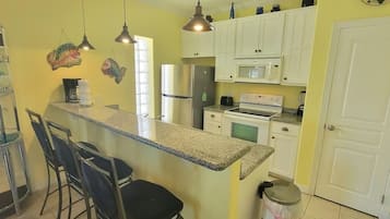 Condo, 2 Bedrooms | Private kitchen | Fridge, oven, stovetop, coffee/tea maker