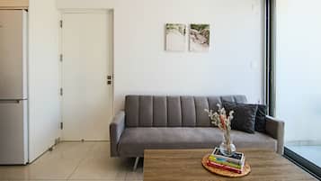 Executive Apartment | Living area | 43-inch Smart TV with cable channels, TV