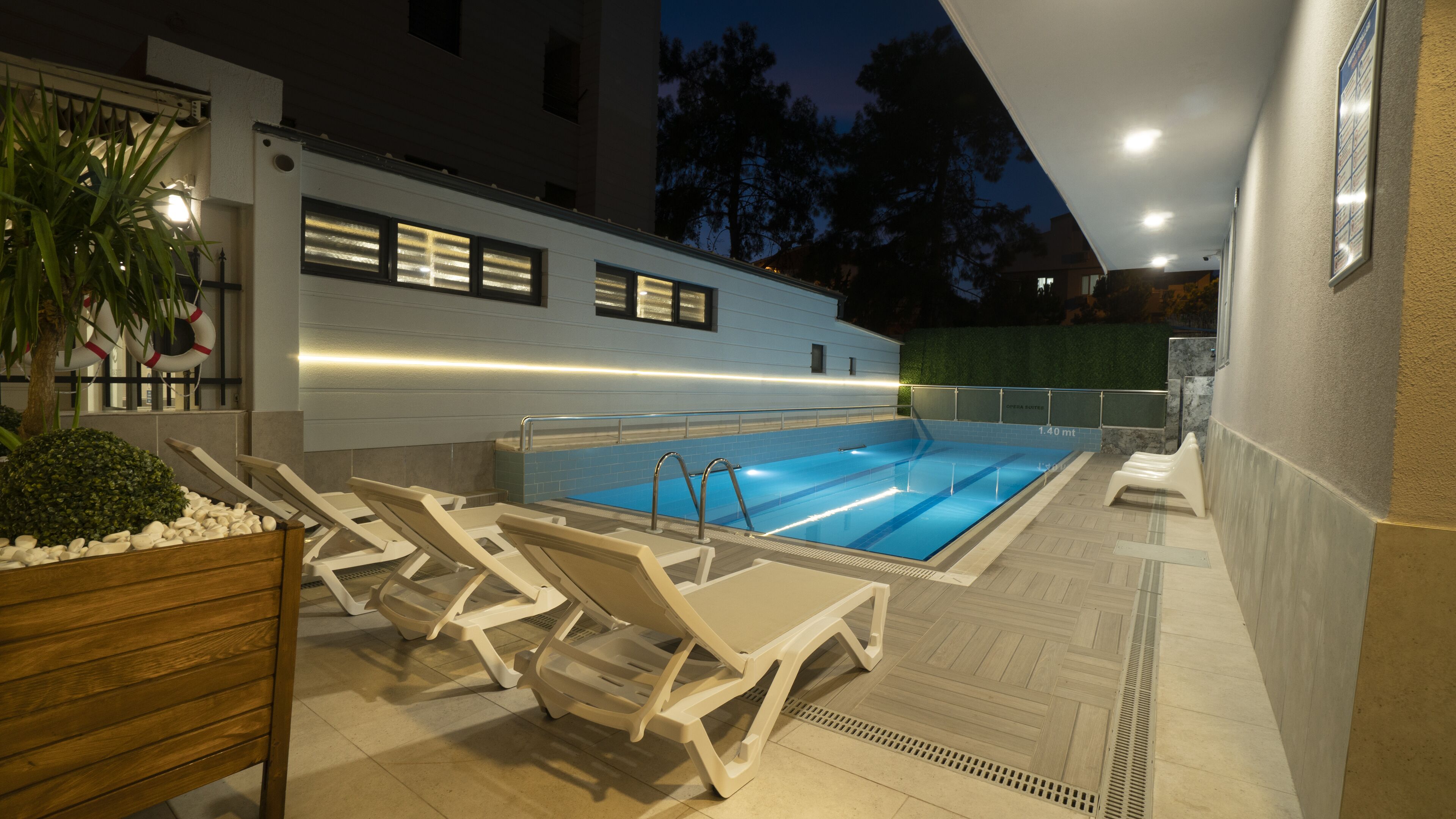 Outdoor pool, open 9:00 AM to 7:00 PM, pool umbrellas, sun loungers