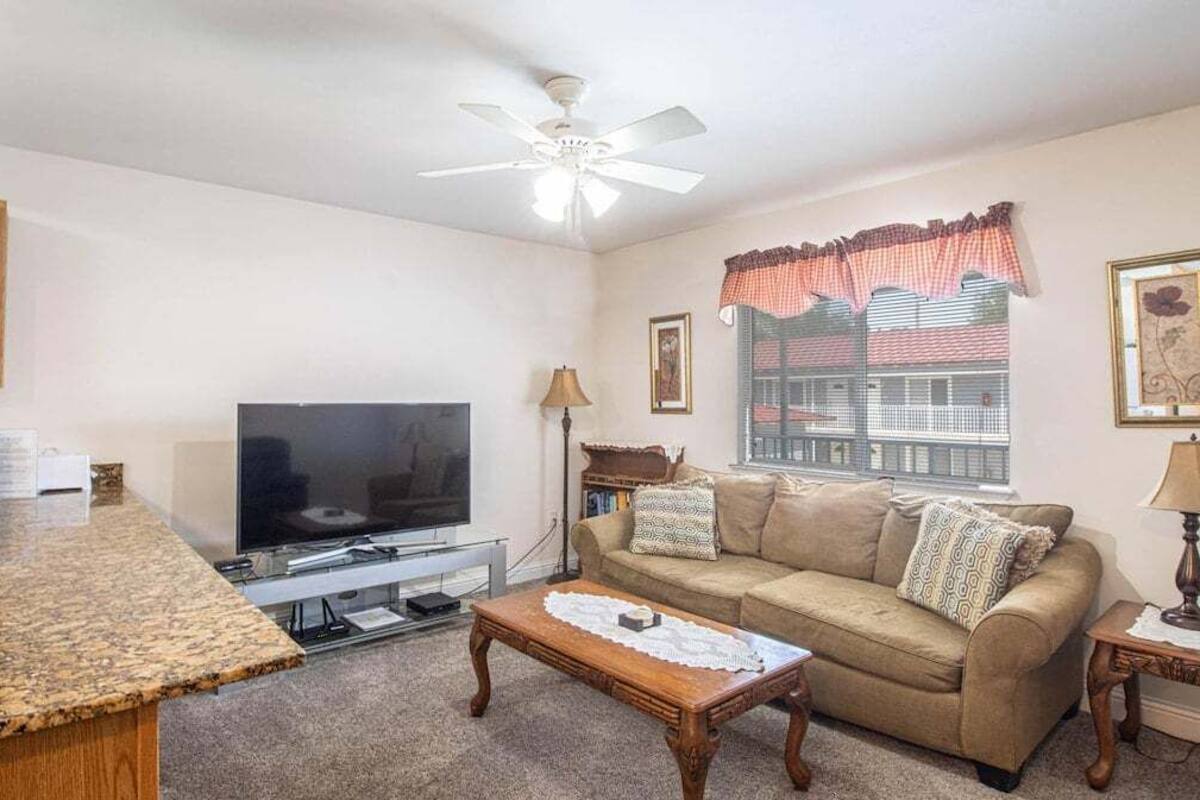 Condo, 1 Queen Bed, Kitchen (Oak Shores Unit 115) | Living area | 42-inch flat-screen TV with digital channels