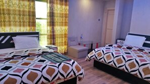 Quarto triplo executivo | Wi-Fi de cortesia, roupa de cama