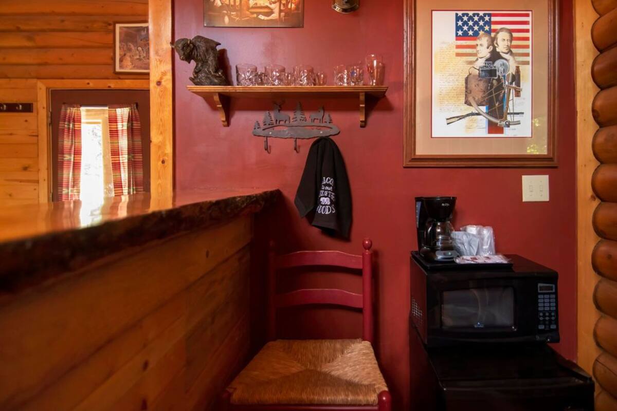 premium cabin, multiple beds, fireplace | 1 bedroom, individually decorated, individually furnished, bed sheets