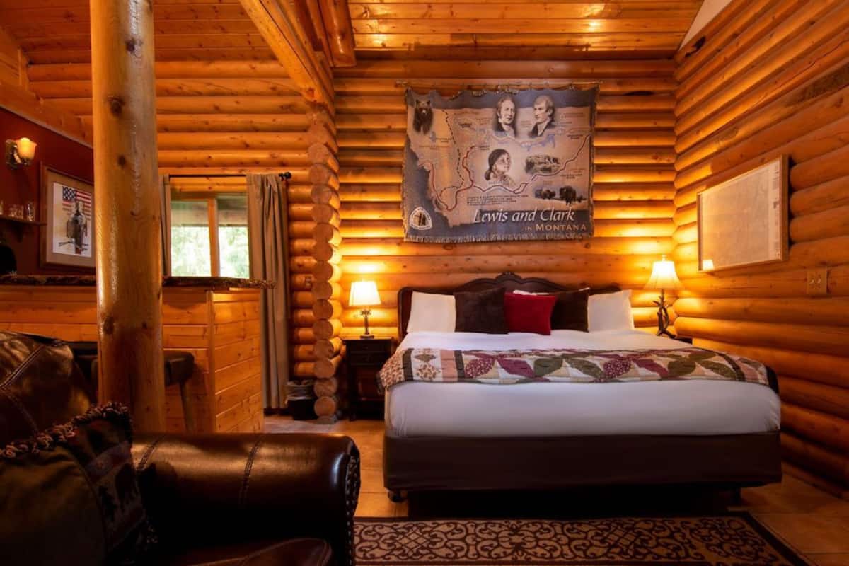 premium cabin, multiple beds, fireplace | 1 bedroom, individually decorated, individually furnished, bed sheets