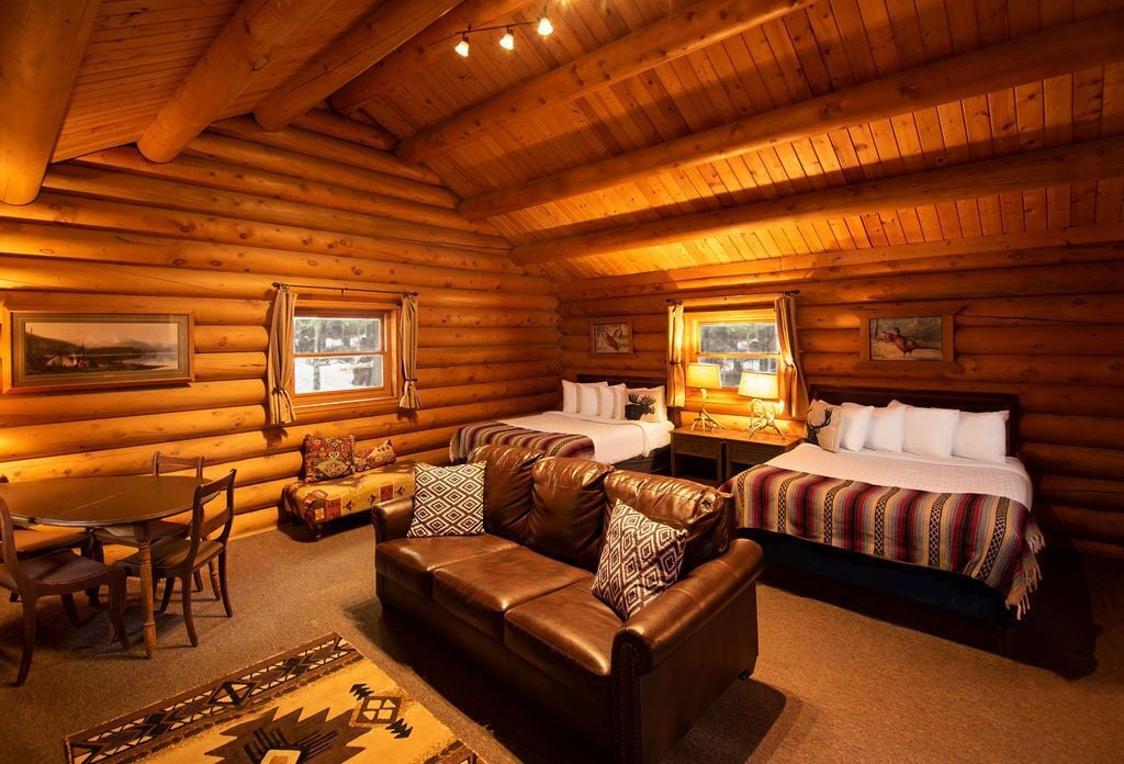 premium cabin, 2 queen beds, accessible, fireplace | 1 bedroom, individually decorated, individually furnished, bed sheets