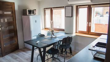 Comfort Apartment | Private kitchen | Cookware/dishes/utensils