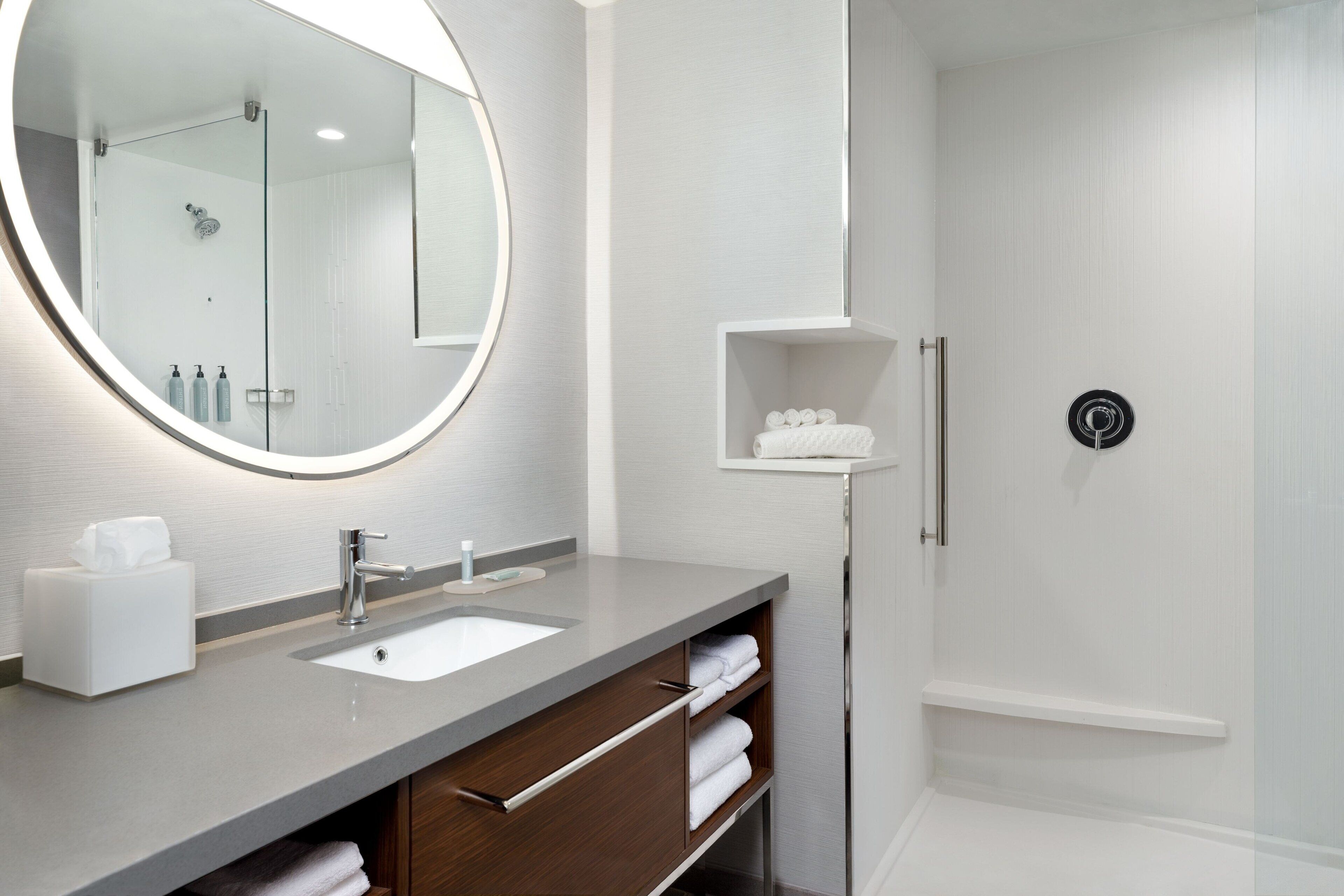 shower, designer toiletries, towels, soap