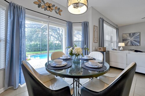 Tasteful Themed Windsor Hills Home w/Heated Pool ~ Just 3 miles to Disney World!