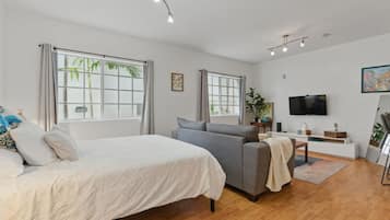 1 bedroom, desk, iron/ironing board, travel crib