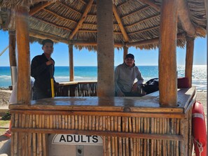 On the beach, sun-loungers, beach towels