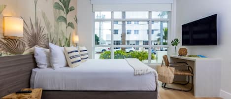 Standard Room, 1 Queen Bed, Accessible, Ground Floor | Individually furnished, desk, laptop workspace, iron/ironing board