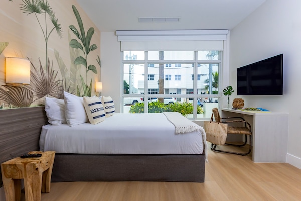 Standard Room, 1 Queen Bed, Accessible, Ground Floor | Individually furnished, desk, laptop workspace, iron/ironing board