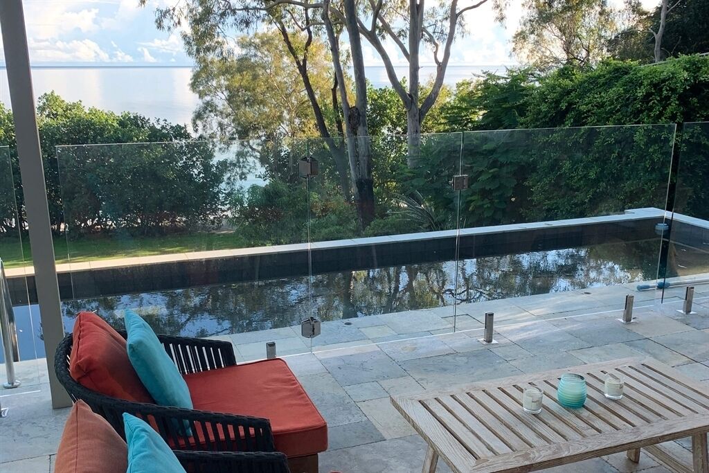 2 Bedroom Beachfront guest cabin with private pool in a garden setting