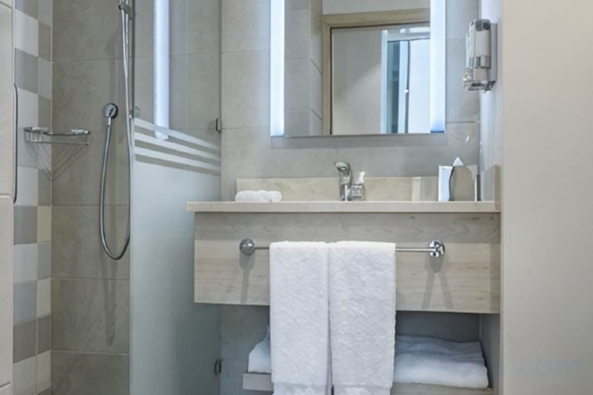 Bathroom | Shower, hair dryer, towels, soap