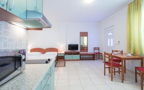 Estúdio (Deluxe Studio Apartment) | Cozinha privada | Geladeira
