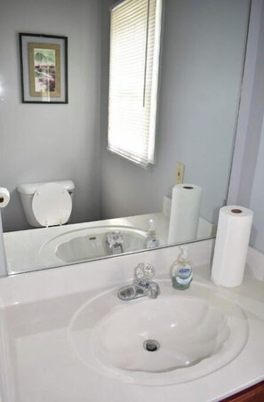 Combined shower/tub, hair dryer, towels, soap