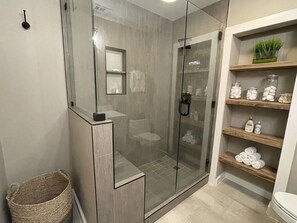 Shower, hair dryer, towels, soap