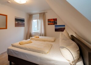 Unclassified image, 3 of 20, button - Ensign in Haus Admiral - Relaxed island life: Cozy vacation apartment in (Sylt)