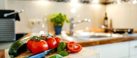 Fridge, microwave, stovetop, coffee/tea maker