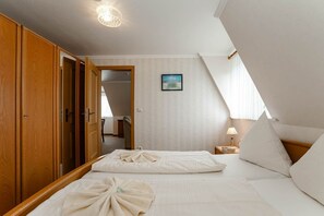 1 slaapkamer, een strijkplank/strijkijzer, wifi, beddengoed