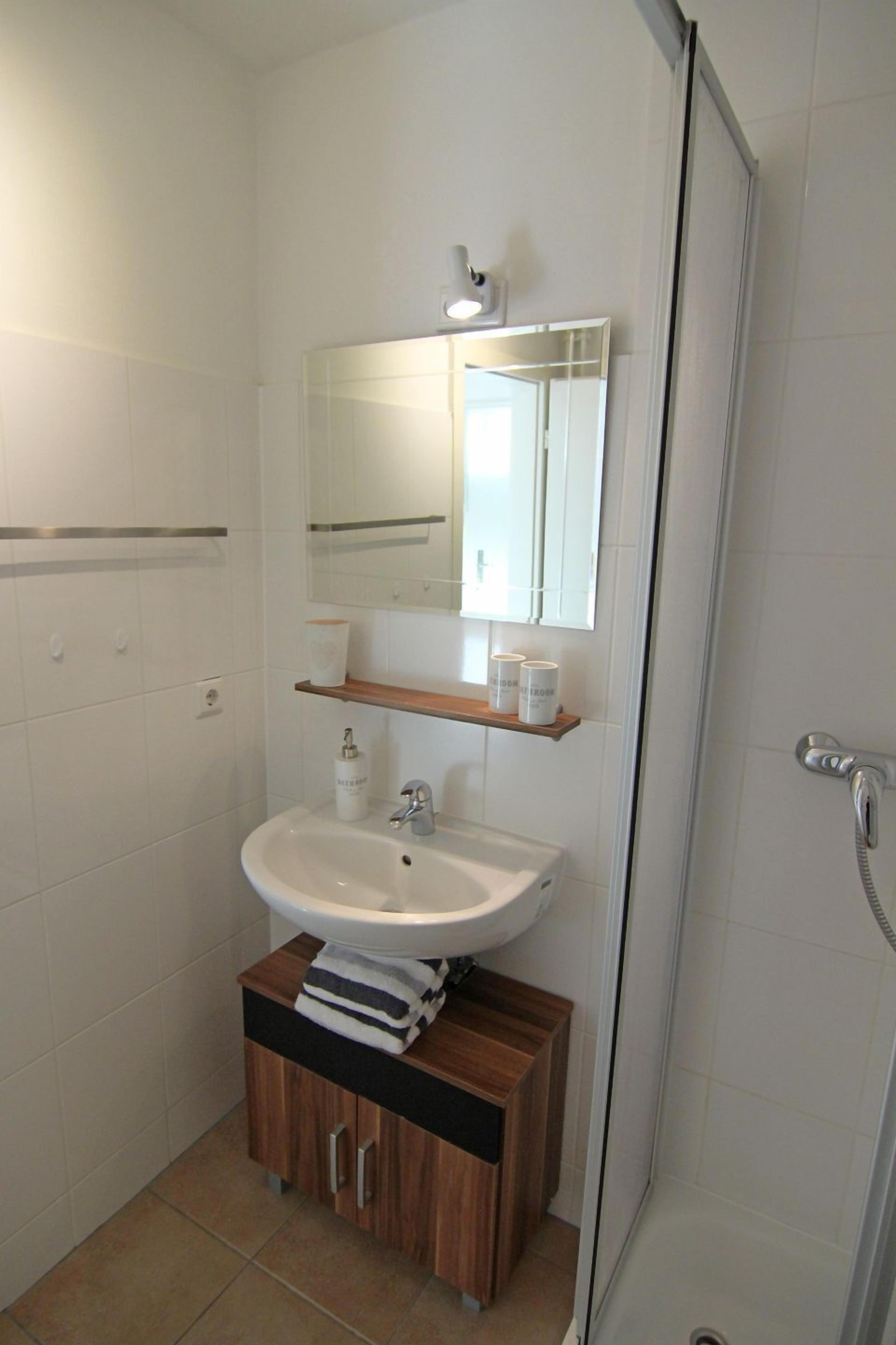 Secador de pelo, toallas