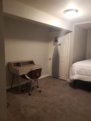 1 bedroom, desk, iron/ironing board, travel crib