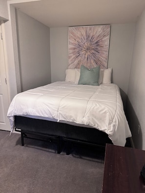 1 bedroom, desk, iron/ironing board, travel crib