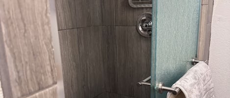 Shower, hair dryer, towels, soap