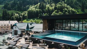Outdoor pool, open 7:30 AM to 7:30 PM, pool umbrellas, pool loungers