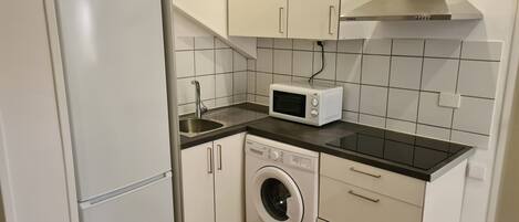 Microwave, stovetop, coffee/tea maker, toaster