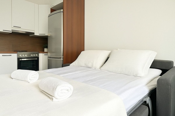 City-Studio | Hochwertige Bettwaren, Reisekinderbett, kostenloses WLAN, Bettwäsche