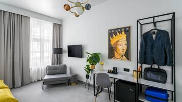 Premium Triple Room | Living area | 43-inch Smart TV with digital channels, TV