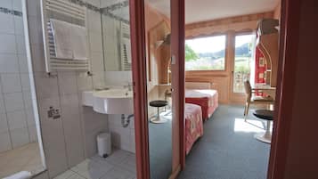 Shower, hair dryer, bathrobes, towels