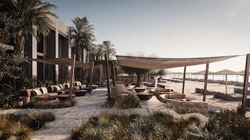 Ubicación a pie de playa, cabañas de uso gratuito, tumbonas y sombrillas