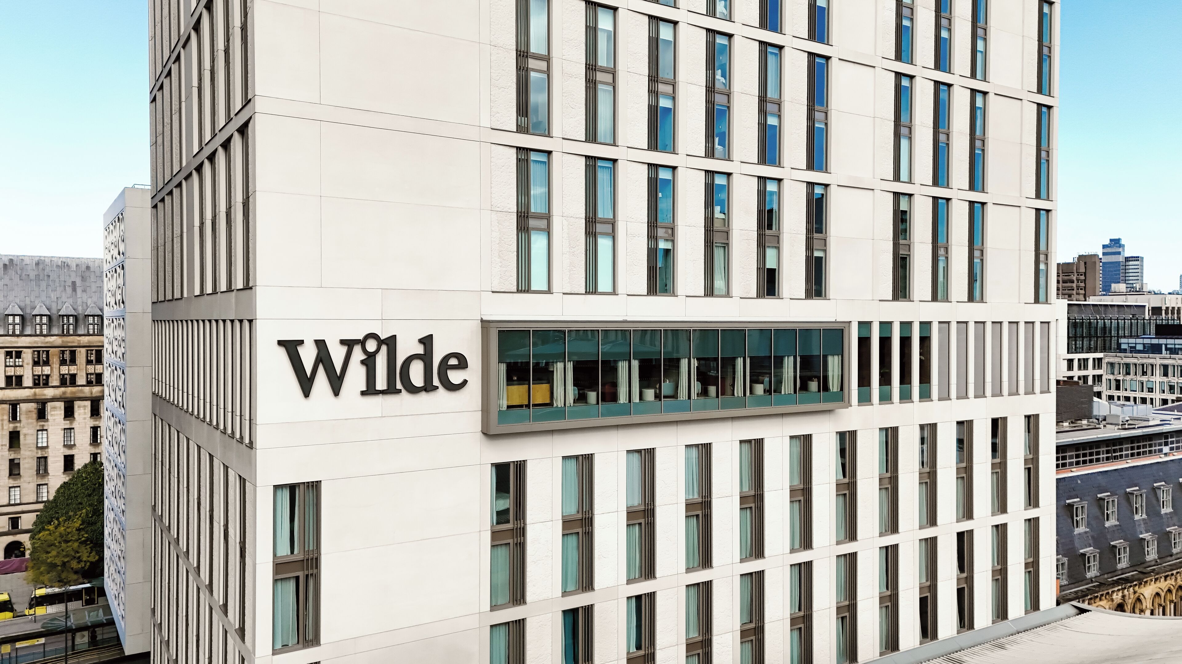 A modern building with the name 'Wilde' prominently displayed on its facade.