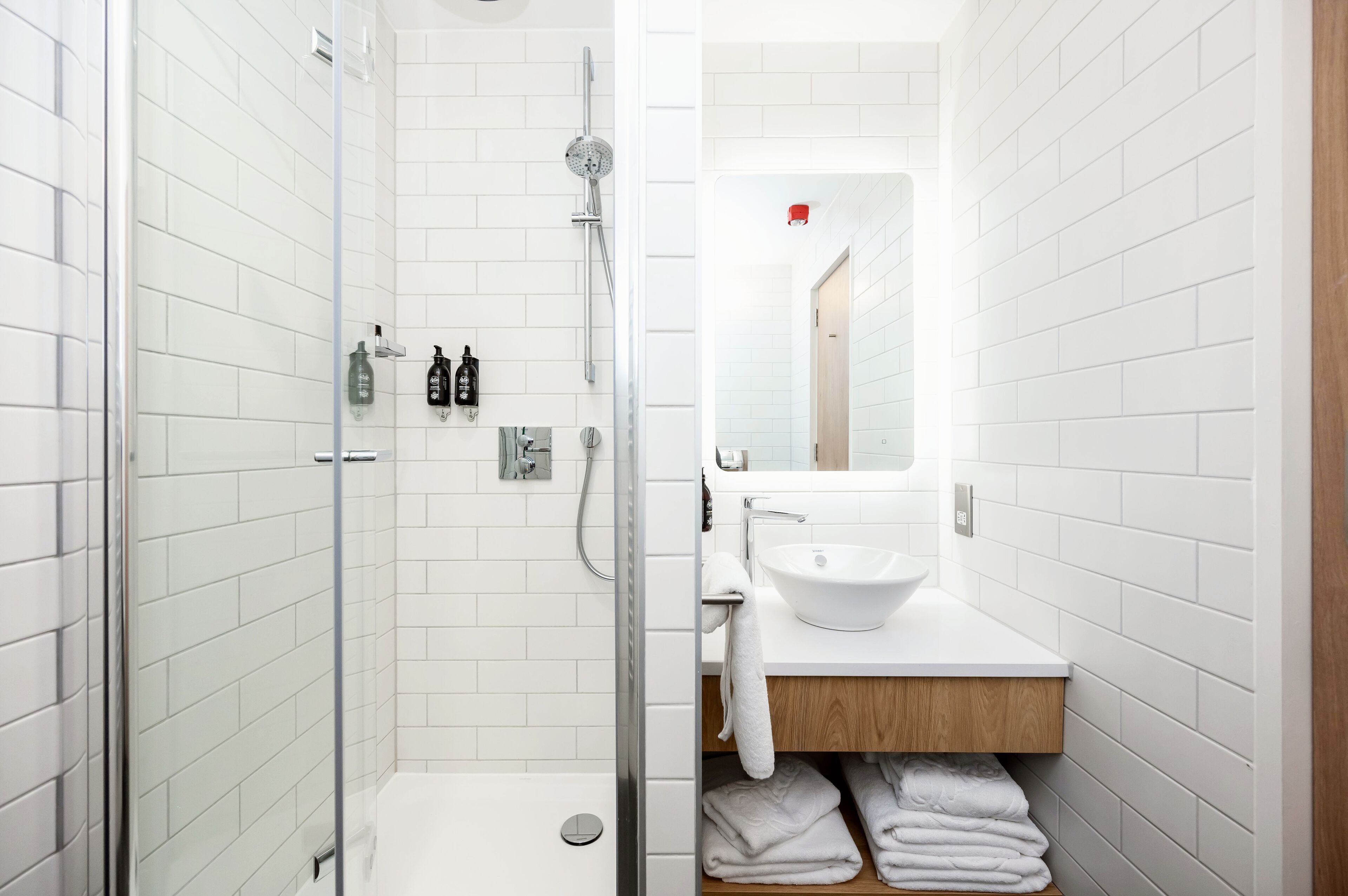 shower, free toiletries, hair dryer, towels