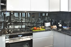 Luxury Apartment | Private kitchen | Fridge, oven, stovetop, dishwasher