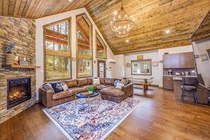 Smart TV, fireplace, table football, books