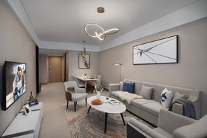 Deluxe-Apartment, 2 Schlafzimmer | Wohnbereich | Flachbildfernseher