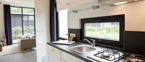 Cube la Mer 4 | Private kitchen | Microwave, coffee/tea maker, cookware/dishes/utensils, dining tables