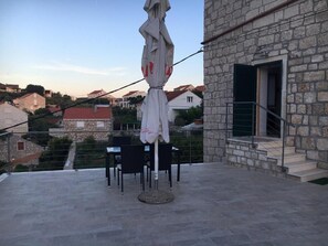 Appartement, 1 chambre, fumeur, patio | Enceinte de l’hébergement