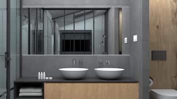 Deluxe Studio Suite | Bathroom | Slippers, towels
