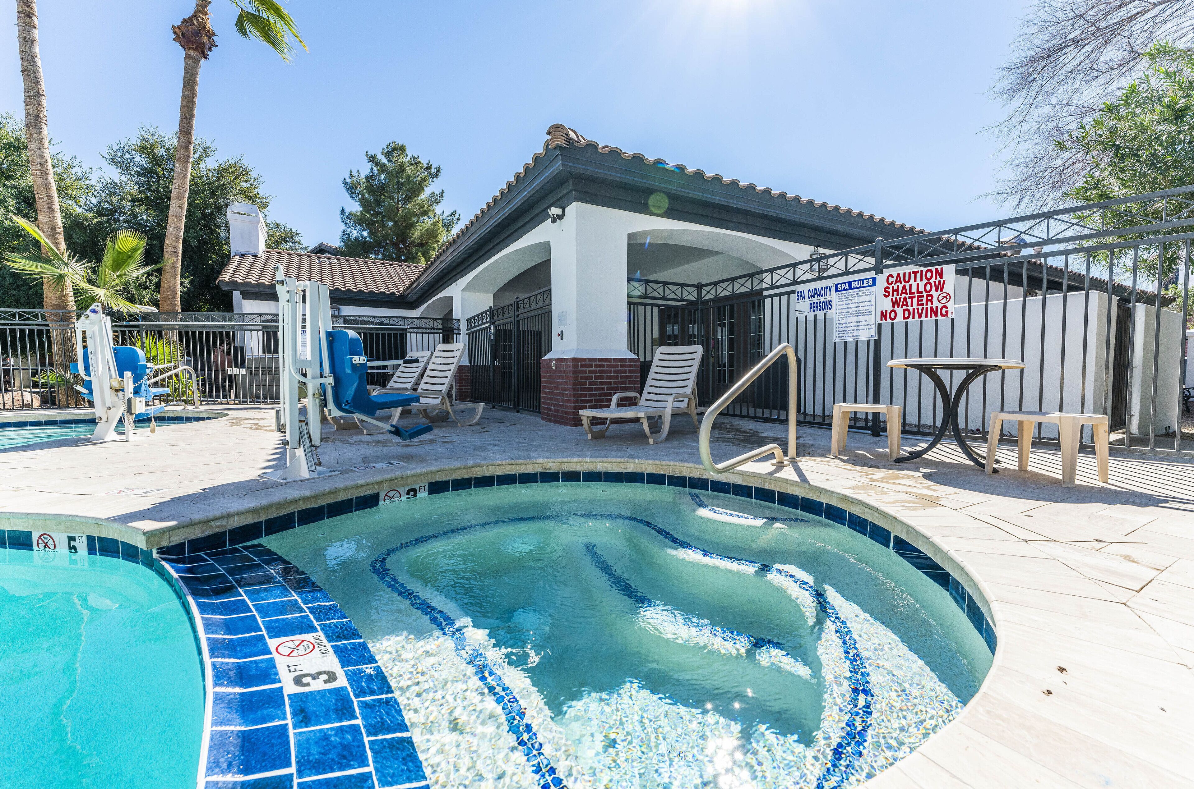 Outdoor pool, open 9:00 AM to 5:30 PM, pool loungers
